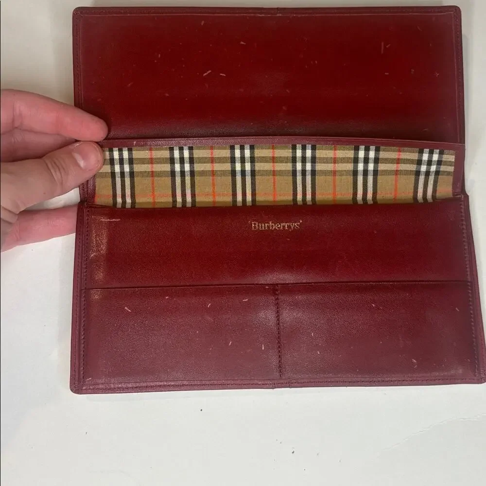 Burberry’s vintage red marroon checkbook wallet